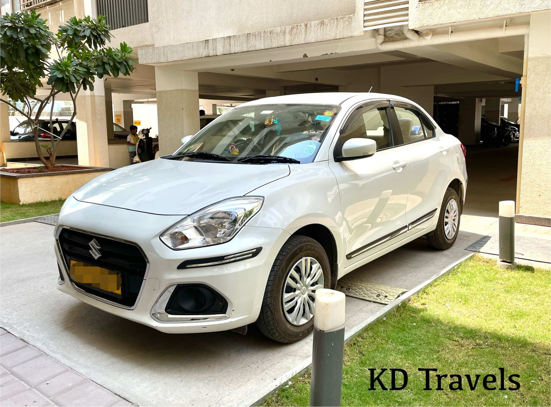 KD Travels white sedan taxi Hyderabad - Swift Dzire for airport transfers and city rides