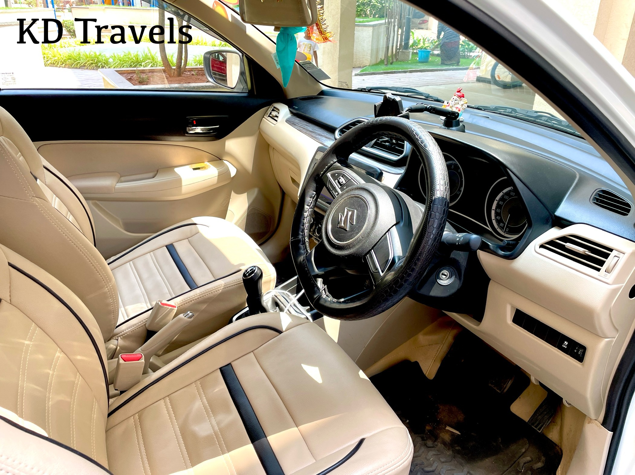 KD Travels sedan interior - clean cabin for Hyderabad city taxi rides